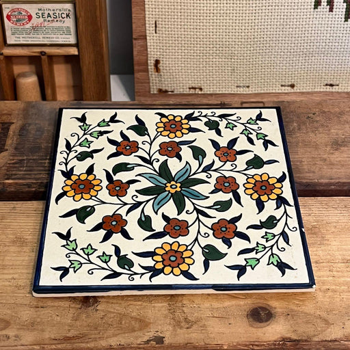 Vintage Ceramic Tile Depicting a Hand Painted Floral Design.(online purchase only)