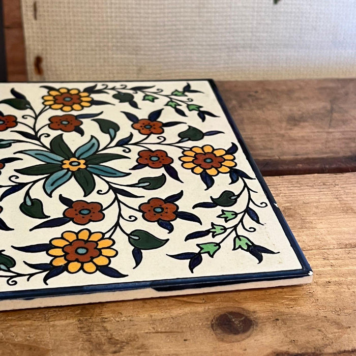 Vintage Ceramic Tile Depicting a Hand Painted Floral Design.(online purchase only)