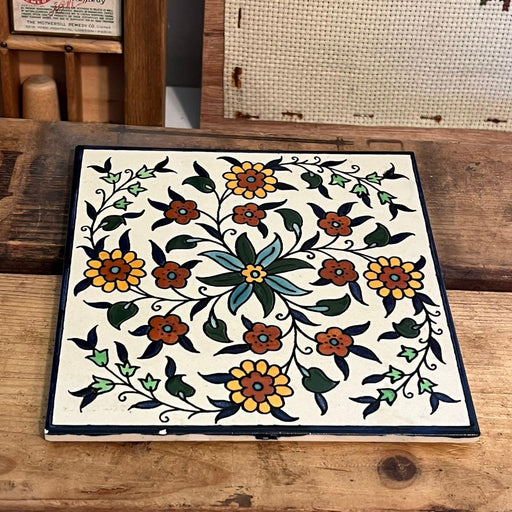 Vintage Ceramic Tile Depicting a Hand Painted Floral Design.(online purchase only)