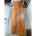 Vintage Danish Modern Coffee Table With Ornate Rosewood Grain and Wicker Shelf