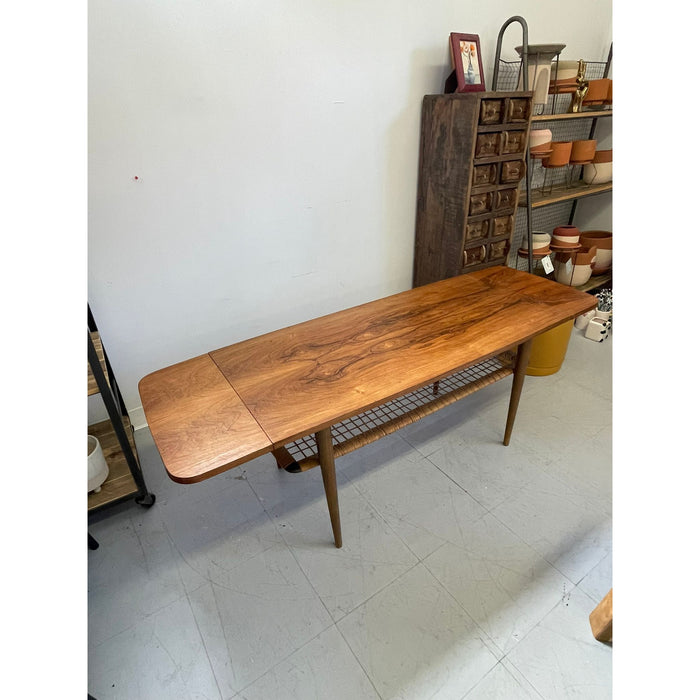 Vintage Danish Modern Coffee Table With Ornate Rosewood Grain and Wicker Shelf