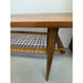 Vintage Danish Modern Coffee Table With Ornate Rosewood Grain and Wicker Shelf
