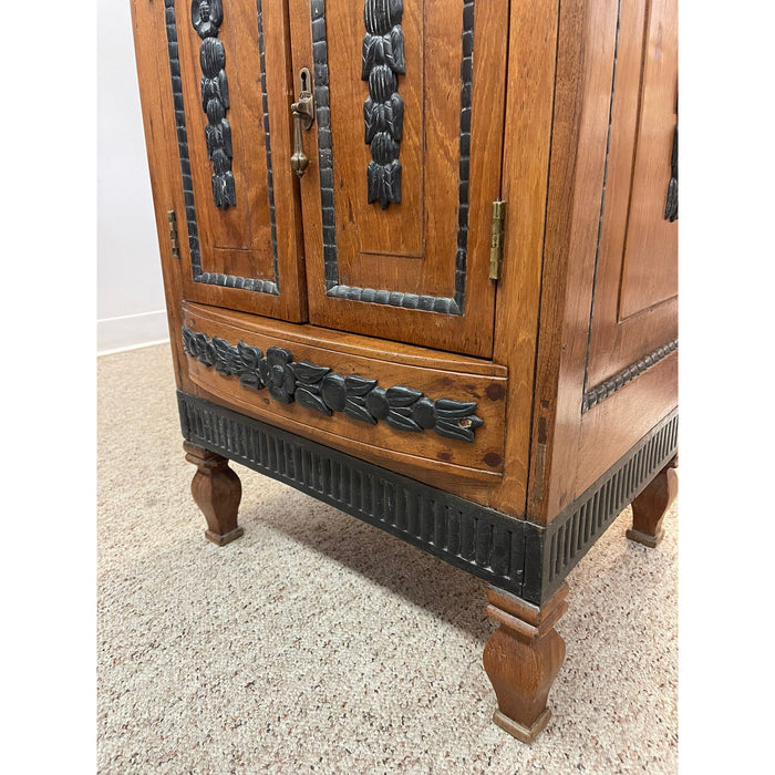 Vintage Dutch Colonial Style Cabinet With Carved Wood Accents.