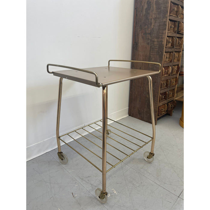 Vintage Gold Colored Cart on Wheels