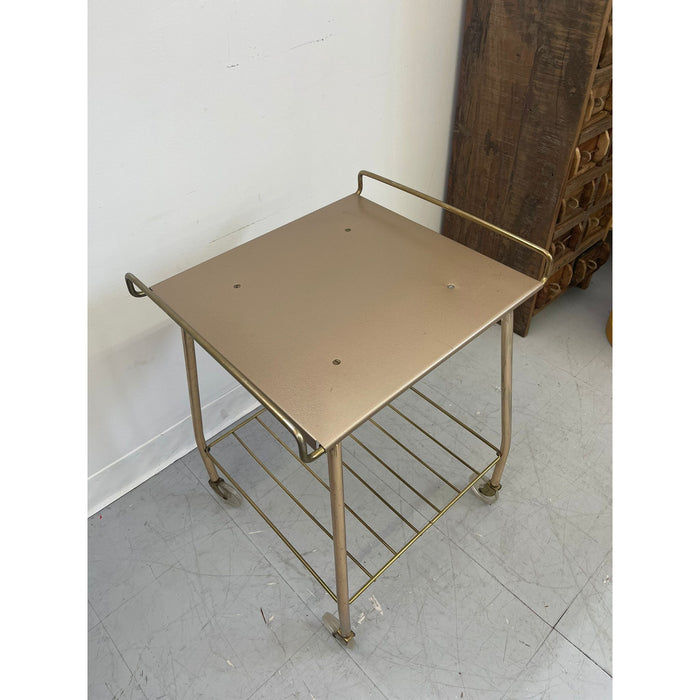 Vintage Gold Colored Cart on Wheels
