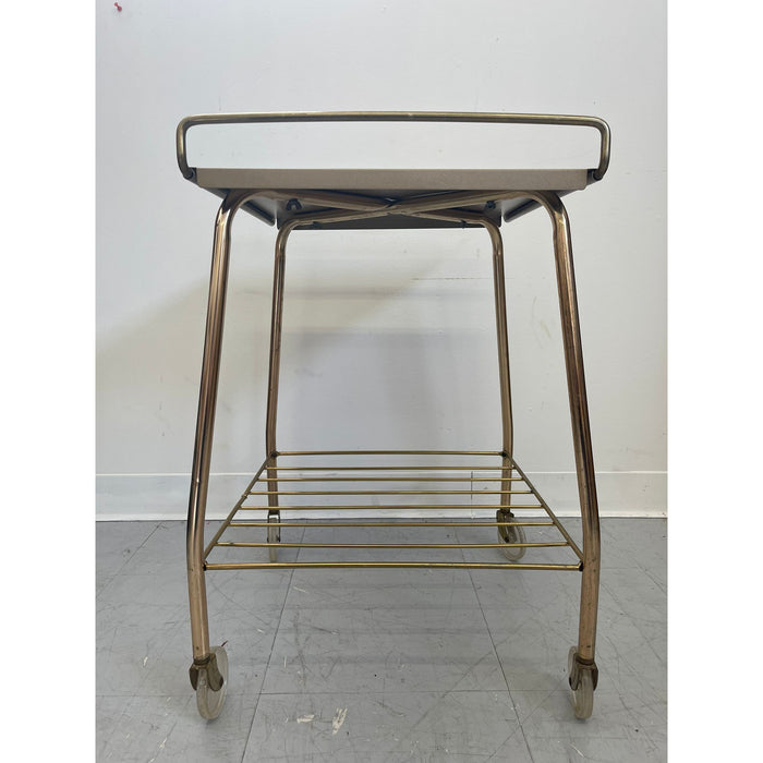 Vintage Gold Colored Cart on Wheels