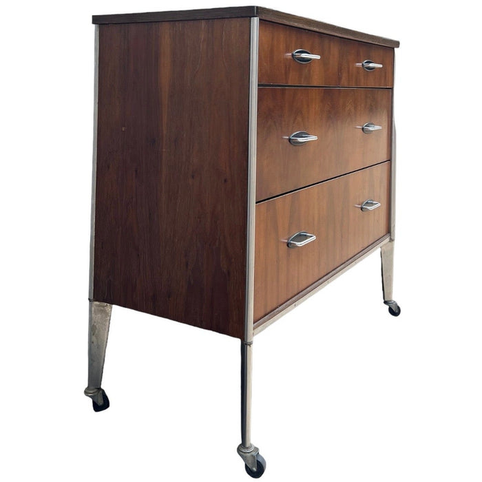 Vintage Mid Century Modern Dresser By Raymond Loewy For Hill Rom Walnut With Casters (Available for Online Purchase Only)