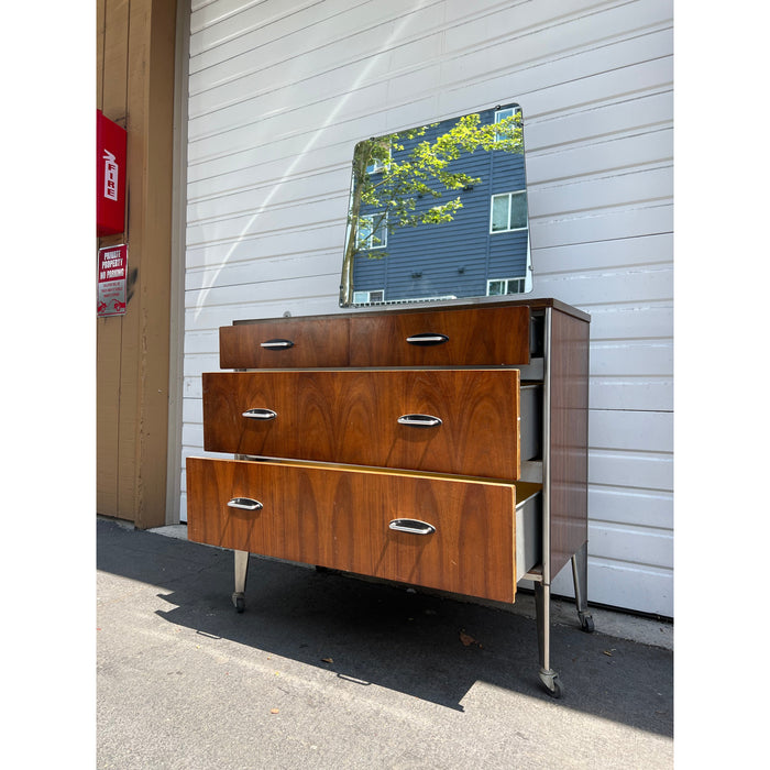 Vintage Mid Century Modern Dresser By Raymond Loewy For Hill Rom Walnut With Casters (Available for Online Purchase Only)