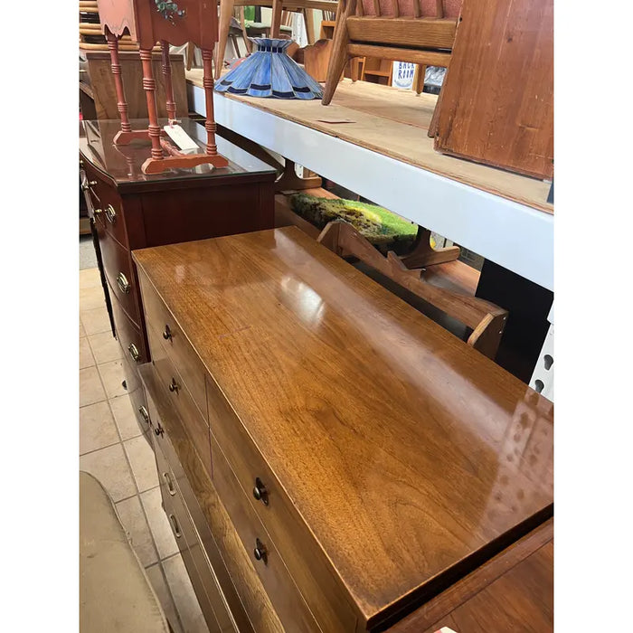 Vintage Mid Century Modern Highboy Walnut Toned Dresser with Elements of Traditional Woodworking with 5 Drawer Storage in the style of Drexel