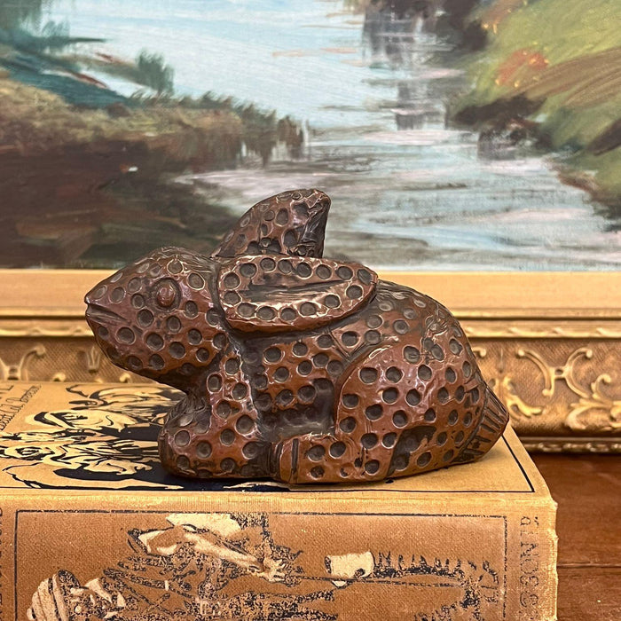 vintage handmade wooden rabbit with possible copper wrapping exterior