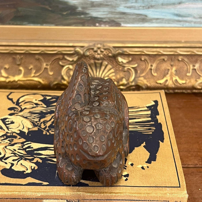 vintage handmade wooden rabbit with possible copper wrapping exterior