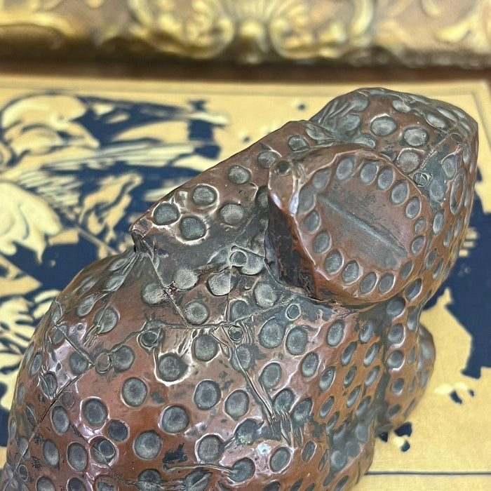 vintage handmade wooden rabbit with possible copper wrapping exterior
