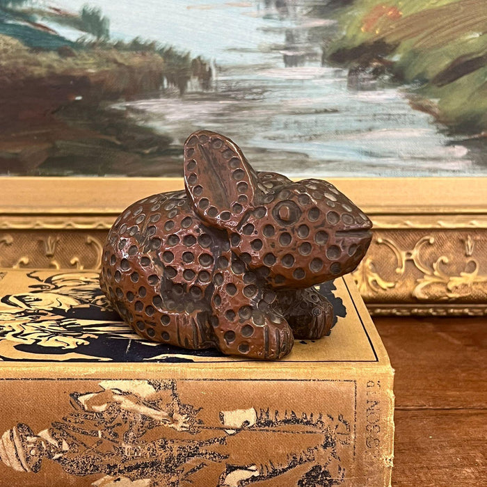 vintage handmade wooden rabbit with possible copper wrapping exterior