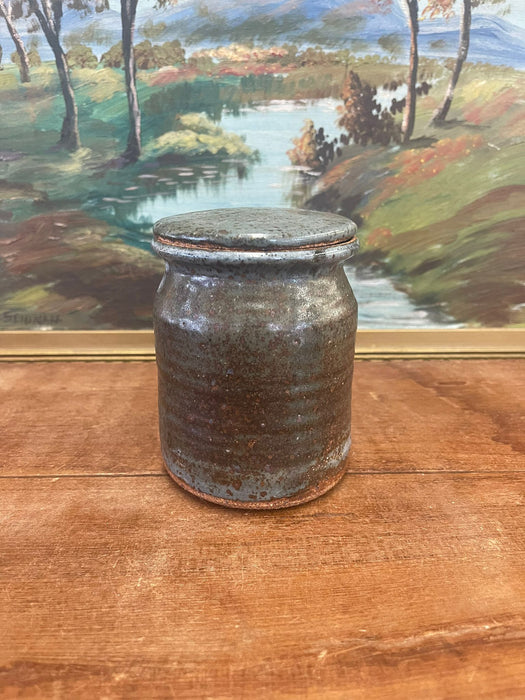 vintage stamped stoneware jar with lid