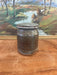 vintage stamped stoneware jar with lid