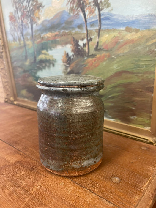 vintage stamped stoneware jar with lid