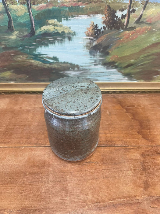 vintage stamped stoneware jar with lid