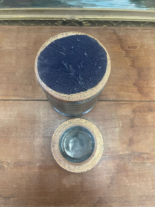 vintage stamped stoneware jar with lid