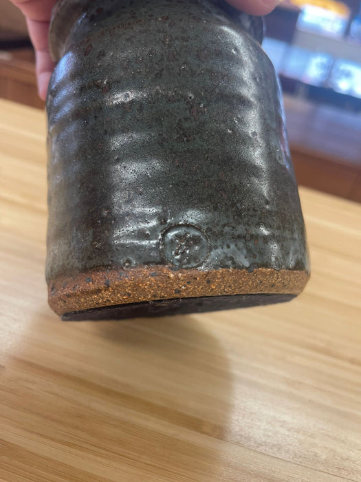 vintage stamped stoneware jar with lid