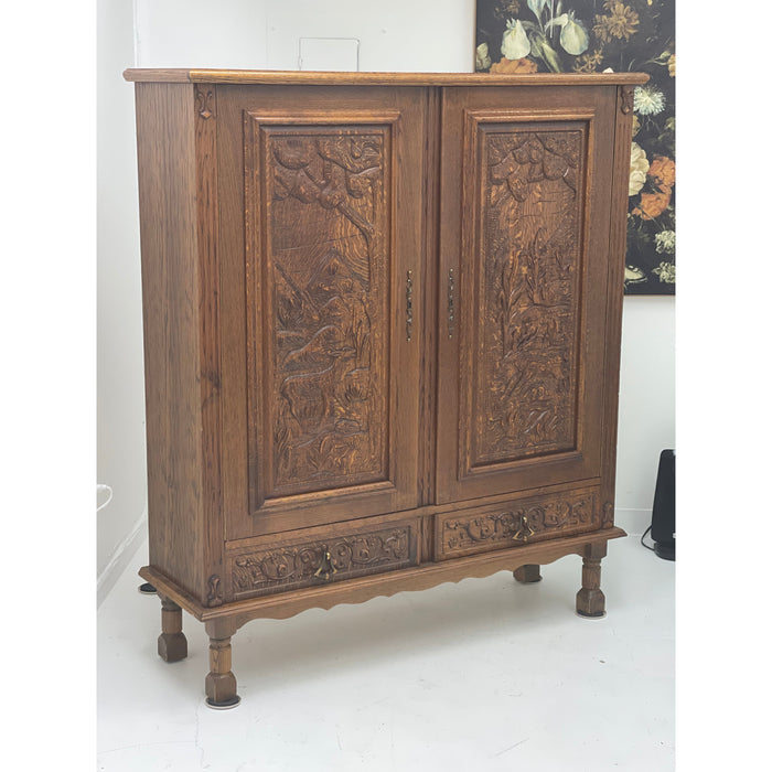 Vintage cabinet from Germany With Hand Carved Motifs