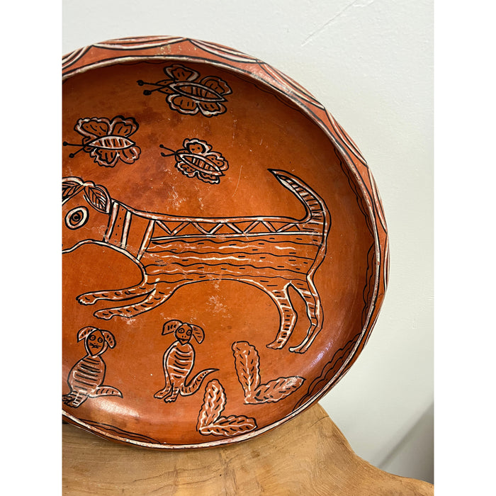 Vintage Handmade Pottery with Hand painted Animal Motif in a Terracotta orange color