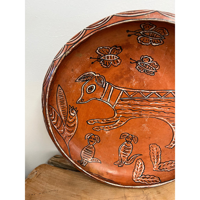 Vintage Handmade Pottery with Hand painted Animal Motif in a Terracotta orange color