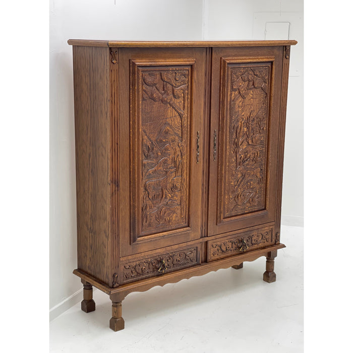 Vintage cabinet from Germany With Hand Carved Motifs. Circa 1930s
