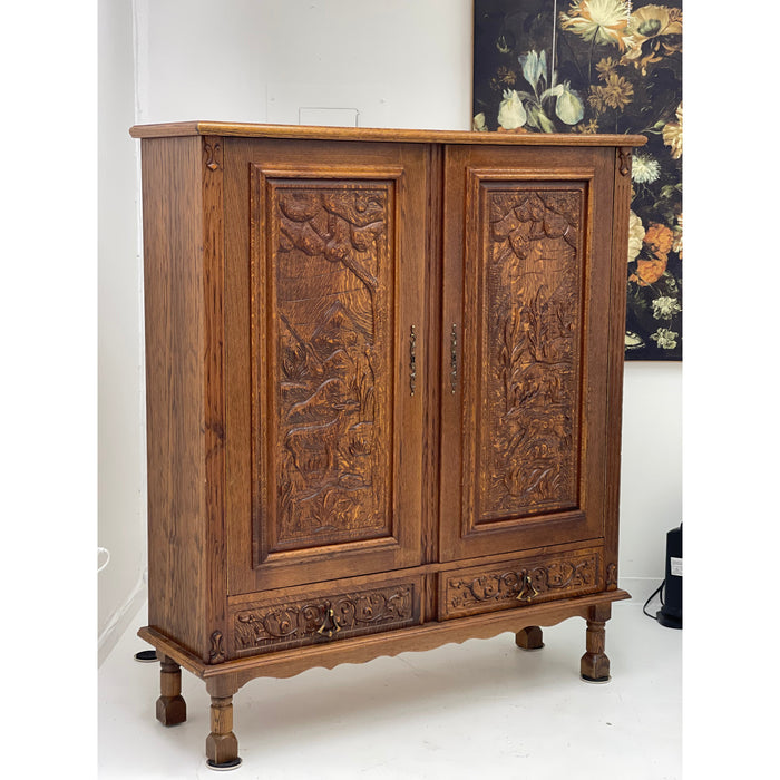 Vintage cabinet from Germany With Hand Carved Motifs. Circa 1930s